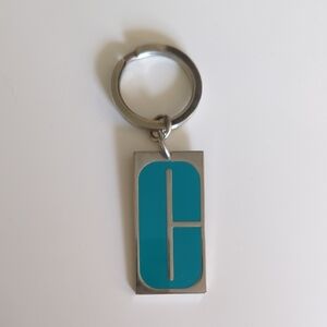 Vintage Clinique Teal and Silver Logo Keychain